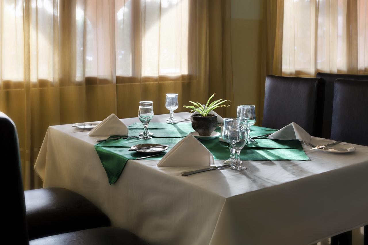 Dunia Hotel ビサウ エクステリア 写真